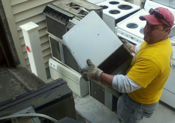 Derr's Hauling loading appliances for removal